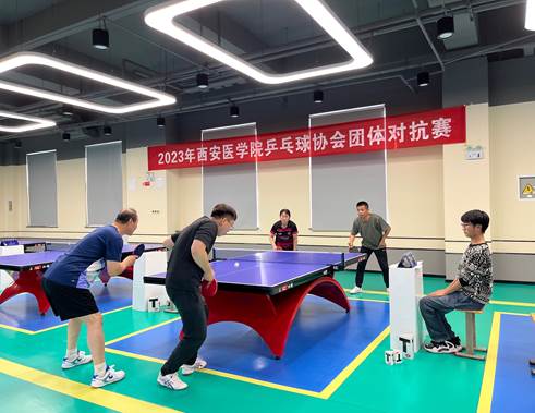 说明: H:\近期工作\11月6日-乒乓球团体对抗赛\2023年乒乓球团体对抗赛通讯报道\比赛照片\图2 精彩瞬间.jpg